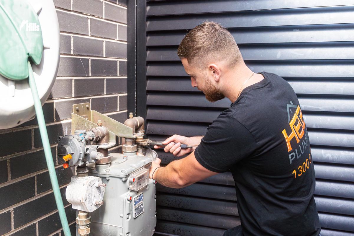 Help Plumbing licensed gas fitter at work on a gas hose box